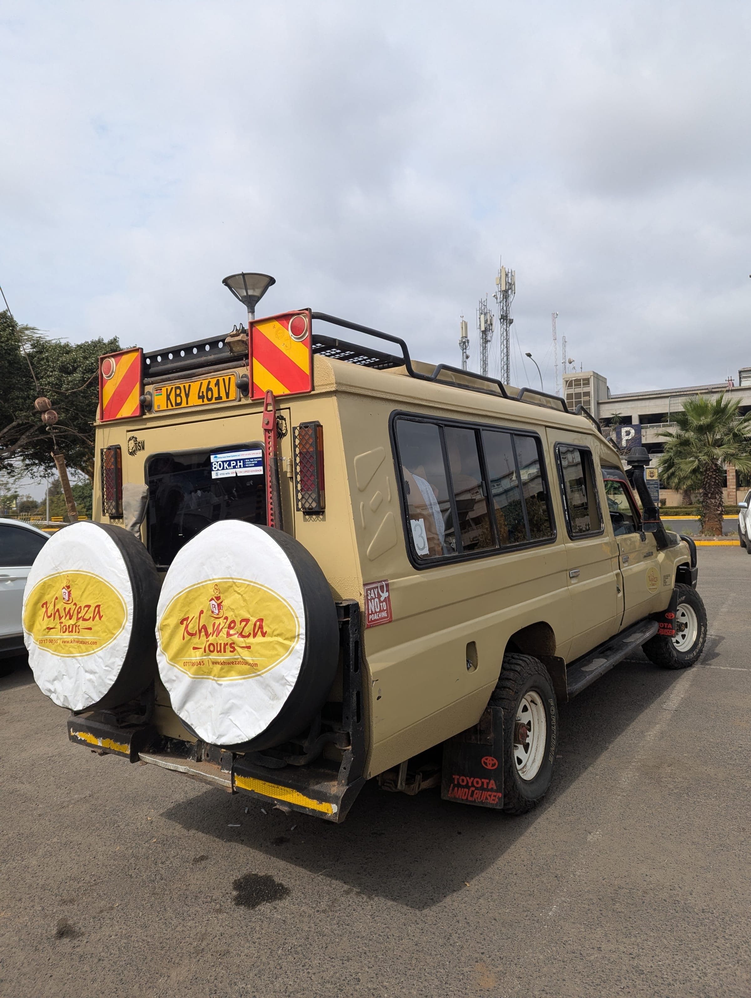 Khweza Tours safari vehicle with spare tire covers