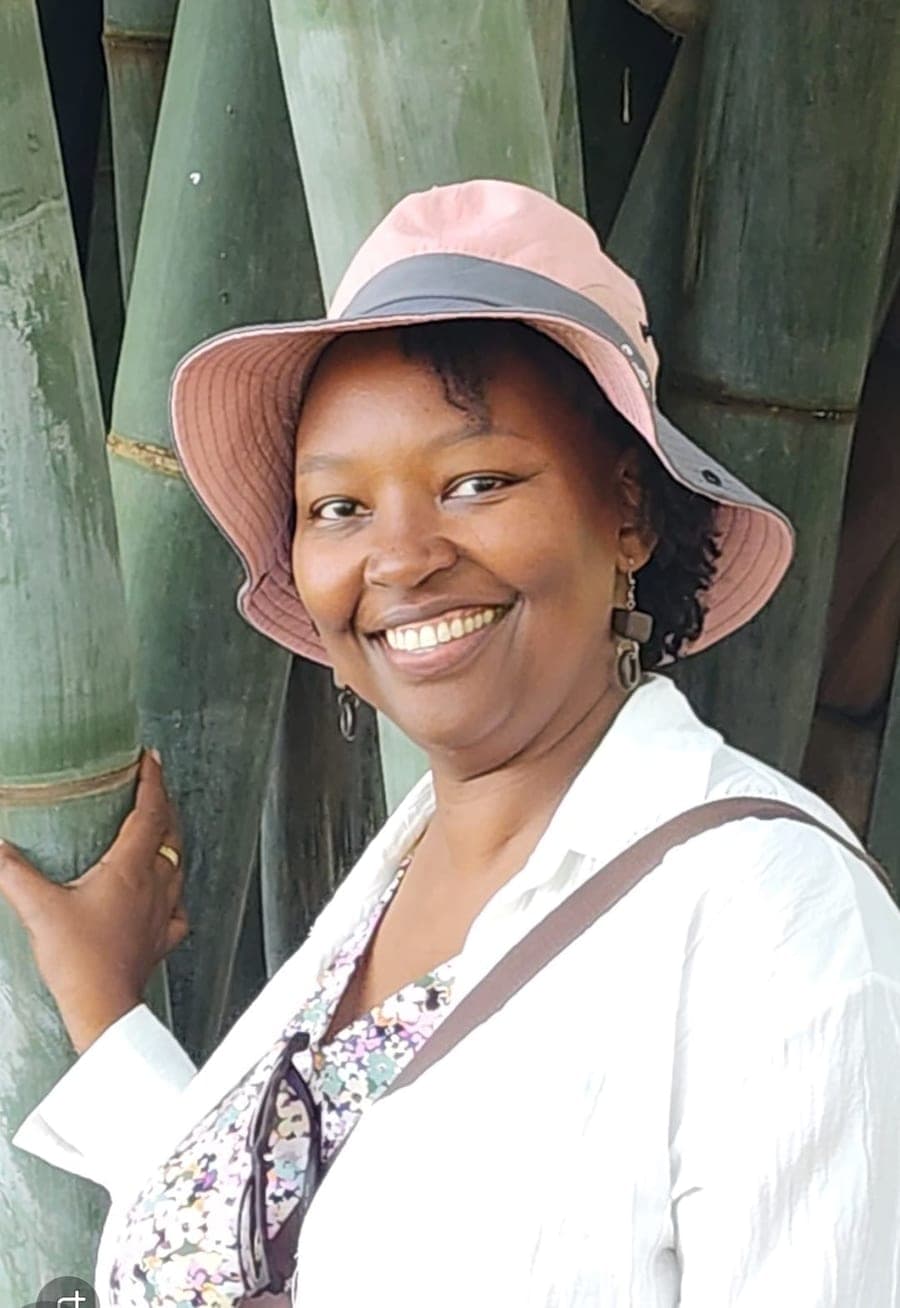 Portrait of Sally Kariuki, Team Lead